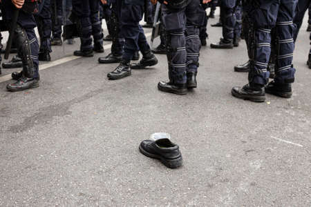Bangkok, THAILAND - August 7, 2021: Riot police attack arrest protesters on control area around the...
