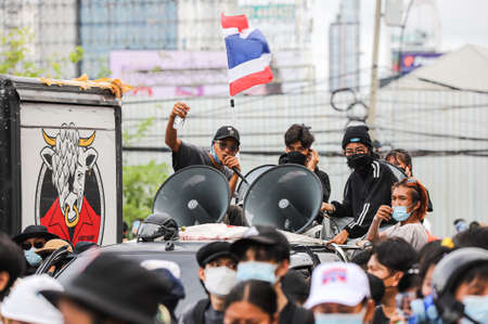 Bangkok, THAILAND - August 13, 2021: Pro-democracy protesters walk to 1st Infantry Regiment for Protest anti-government about agricultural products price drop and failed covid-19 management.のeditorial素材