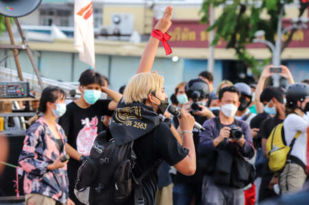Bangkok, THAILAND - August 18, 2021: Pro-democracy protesters "Thalufah" a three finger salute to show symbolic gestures at Democracy Monument.のeditorial素材