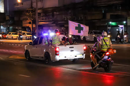 Bangkok, THAILAND - August 22, 2021: The Emergency response unit for the people Team standby near clashed point between prostesters and Riot police.のeditorial素材