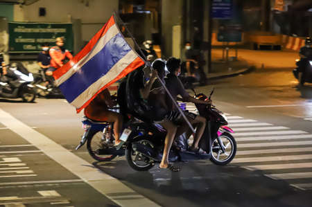 Bangkok, THAILAND - August 22, 2021: Anti-goverment protesters clashed Riot police at Vibhavadi Rangsit Road near Din Daeng Junction on the way to PM Prayut house.のeditorial素材