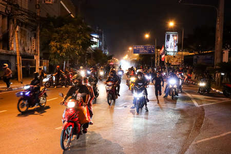 Bangkok, THAILAND - August 22, 2021: Anti-government protesters clashed Riot police at Vibhavadi Rangsit Road near Din Daeng Junction on the way to 1st Infantry Regiment, PM Prayut house.のeditorial素材