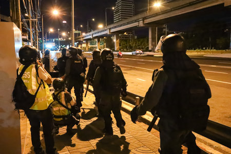 Bangkok, THAILAND - September 12, 2021: Police officer order Press media to stay behind Riot police line during crackdown Anti-government protesters operation.のeditorial素材