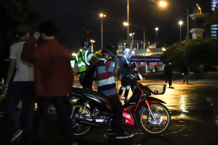 Bangkok, THAILAND - September 12, 2021: Anti-government protesters clashed Riot police at Vibhavadi Rangsit Road near Royal Thai Army Band Department on the way to 1st Infantry Regiment, PM house.のeditorial素材