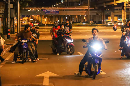 Bangkok, THAILAND - September 12, 2021: Anti-government protesters clashed Riot police at Vibhavadi Rangsit Road near Royal Thai Army Band Department on the way to 1st Infantry Regiment, PM house.のeditorial素材