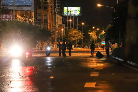 Bangkok, THAILAND - September 12, 2021: Anti-government protesters clashed Riot police at Vibhavadi Rangsit Road near Royal Thai Army Band Department on the way to 1st Infantry Regiment, PM house.のeditorial素材