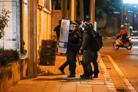 Bangkok, THAILAND - September 12, 2021: Riot police take control area after crackdown Anti-government protesters at Mit Maitri Road opposite 1st Infantry Regiment, PM Prayut house.のeditorial素材