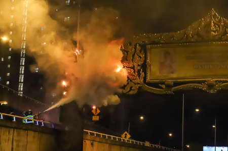 Bangkok, THAILAND - September 12, 2021: Rescue team used Dry Chemical to extinguish the fire that burned the Royal Commemorative Arch on Chaloem Maha Nakhon Expressway.のeditorial素材