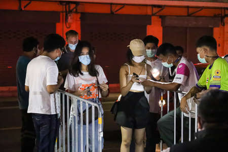 Bangkok, THAILAND - November 6, 2021: Before entering Khao San Road Must pass the screening point for vaccination complete 2 dose, if not fully vaccinated must be examined with a ATK test kit.のeditorial素材