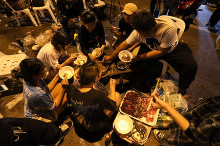 Bangkok, THAILAND - January 1, 2021: Pro-democracy protesters gather in front of the Bangkok Special Prison to organize activities to celebrate the New Year's countdown with fellow political prisonersのeditorial素材