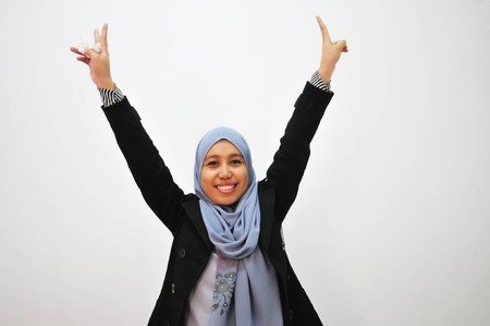 Young businesswoman happy and comfort with white backgroundの写真素材