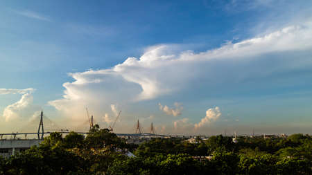 Blue sky with white clouds and bridge.の写真素材