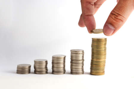 Hand holding coins white background 