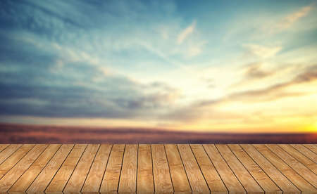 Wood table top on blue sea & sky background can put or montage your products for display - beach & summer conceptsの写真素材