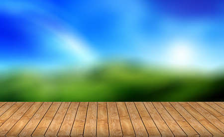 Wood table top on blurred blue background - can be used for display or montage your productsの写真素材