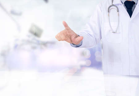 Doctor hand pointing on empty space (virtual screen) - can be used  your texts or picturesの写真素材