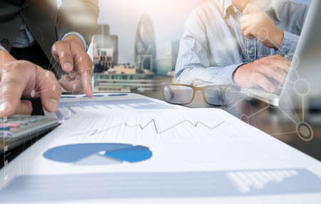 business documents on office table  laptop computer and graph business with social network diagram...