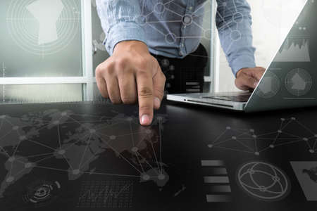 businessman hand working with modern technology and digital layer effect as business strategy...