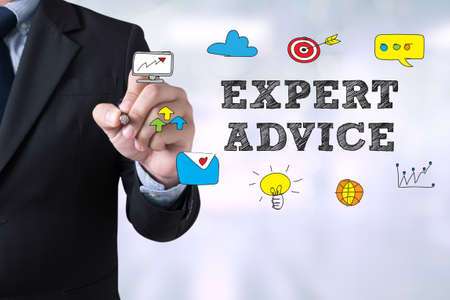 Businessman drawing Landing Page expert advice concept on blurred abstract backgroundの写真素材