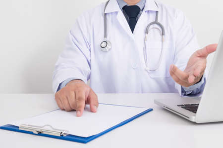 Close up shot of a male doctor touch on, computerの写真素材