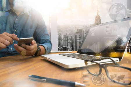 flare light, Double exposure of business man hand working on blank screen laptop computer on wooden desk as concept with social media diagramの写真素材