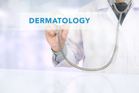 Medicine doctor hand working, DERMATOLOGY sign virtual screenの写真素材
