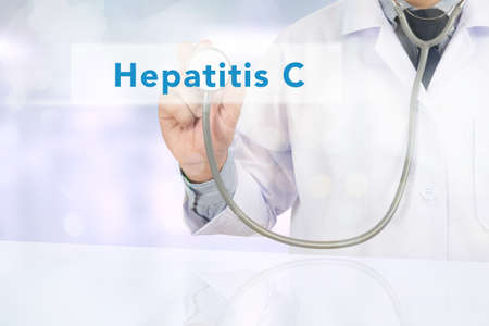 Medicine doctor working with computer interface as medical hepatitis Cの写真素材