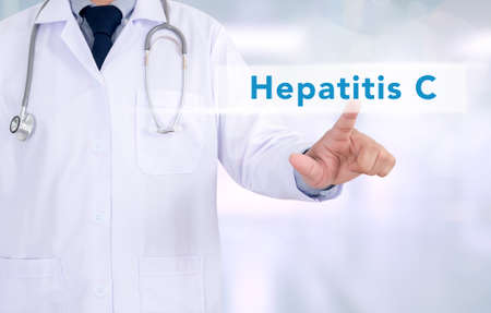 Medicine doctor working with computer interface as medical hepatitis Cの写真素材