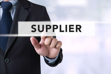 Businessman touch suppliers concept on  Page concept on blurred abstract backgroundの写真素材