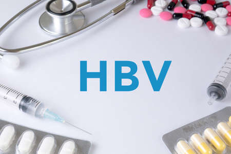 HBV CONCEPT (hepatitis B virus) Text, On Background of Medicaments Composition, Stethoscope, mix therapy drugs doctorの写真素材