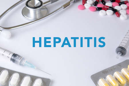 HEPATITIS CONCEPT Text, On Background of Medicaments Composition, Stethoscope, mix therapy drugs doctorの写真素材