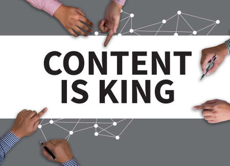 CONTENT IS KING concept vintage blackboard with wooden frame on white background.の写真素材