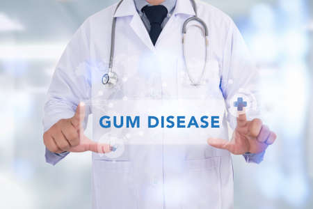 GUM DISEASE CONCEPT Medicine doctor hand workingの写真素材