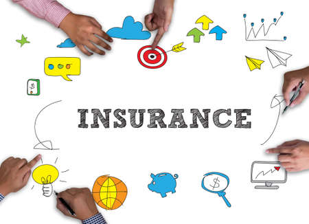INSURANCE CONCEPT  vintage blackboard with wooden frame on white background.の写真素材