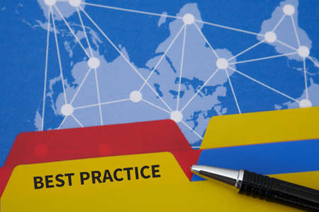 BEST PRACTICE CONCEPT      Office folder color on Desktop on table and business strategyの写真素材