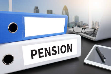 PENSION Office folder on Desktop on table with Office Supplies.の写真素材