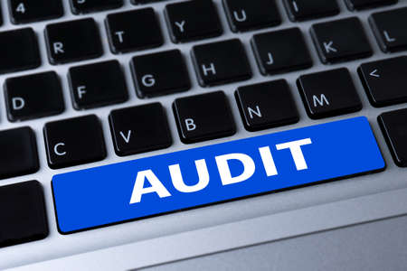 AUDIT a message on keyboardの写真素材