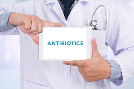 ANTIBIOTICS CONCEPT Doctor holding  digital tabletの写真素材