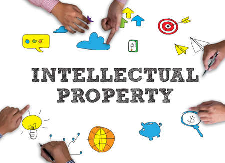 INTELLECTUAL PROPERTY vintage blackboard with wooden frame on white background.の写真素材