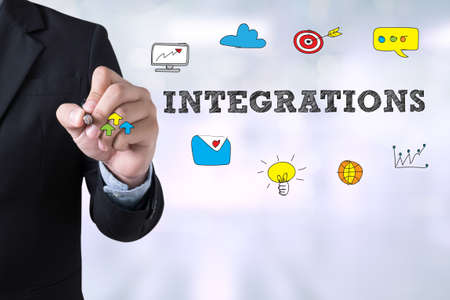 INTEGRATIONS Businessman drawing Landing Page on blurred abstract backgroundの写真素材