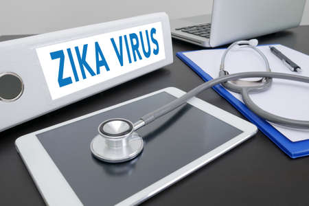 ZIKA VIRUS folder on Desktop on table. ipadの写真素材