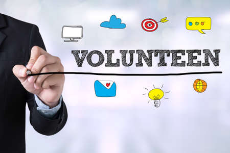 VOLUNTEEN Businessman drawing Landing Page on blurred abstract backgroundの写真素材