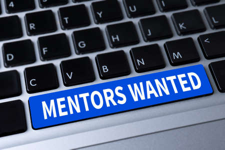 MENTORS WANTED a message on keyboardの写真素材