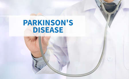 PARKINSON'S DISEASE Medicine doctor hand working on virtual screenの写真素材