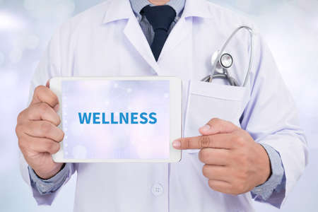WELLNESS Doctor holding  digital tabletの写真素材