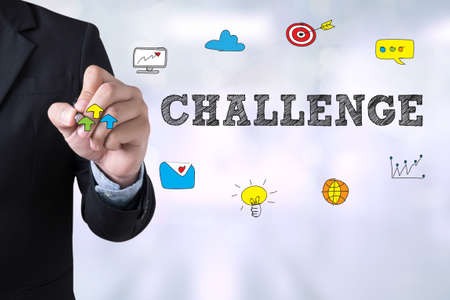 CHALLENGE Businessman drawing Landing Page on blurred abstract backgroundの写真素材