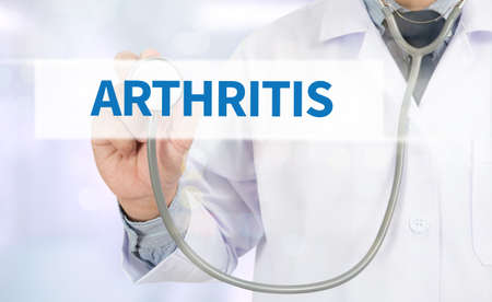 ARTHRITIS Medicine doctor hand working on virtual screenの写真素材