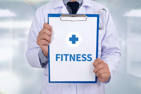 FITNESS Portrait of a doctor writing a prescriptionの写真素材