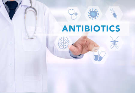 ANTIBIOTICS CONCEPT Medicine doctor working with computer interface as medicalの写真素材