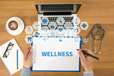 WELLNESS Top view, Doctor writing medical records on a clipboard, medical equipmentの写真素材